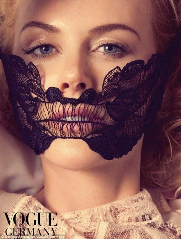 Nicole Kidman wearing symbolic gag in a picture for Vogue magazine.