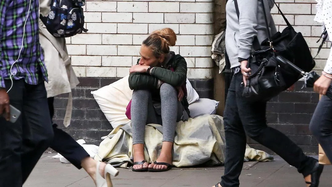 A Homeless Woman - the indigenous poor gets no financial help from immoral governments corrupted by globalism, while 'Orchestrated Migration' is fully funded by national borrowing and taxes.