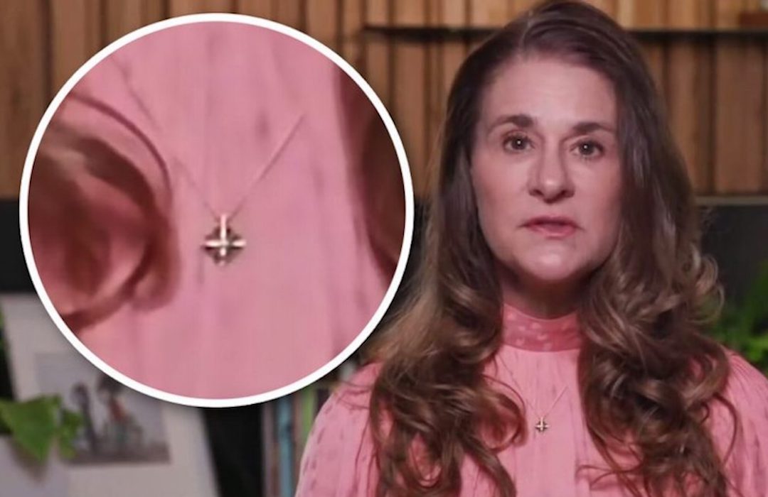 Melinda Gates wearing the inverted Christian cross of satanism.